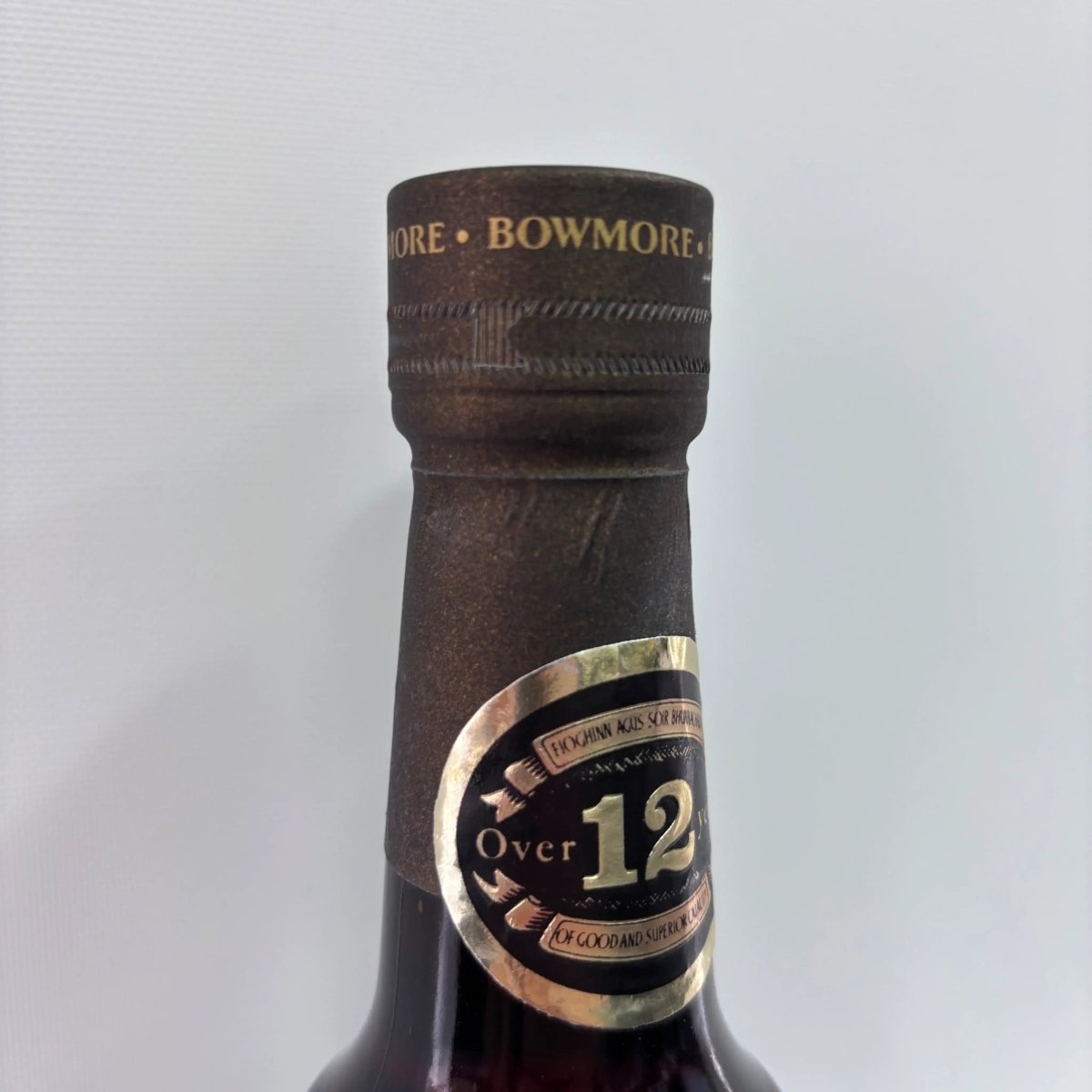 C10079 - Bowmore 12YO, 1980, Dumpy Brown Bottle - Gold label, 43% (WB89.28) -