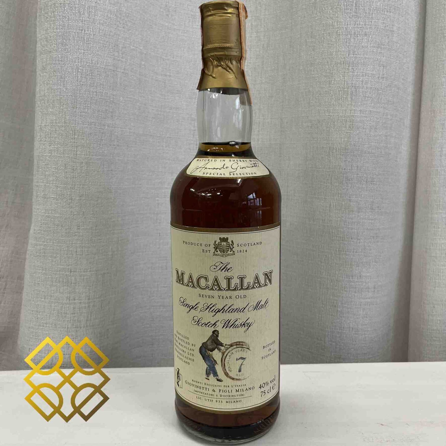 Macallan  Type : Single Malt Whisky Cask Type : Sherry Age : 7YO stand