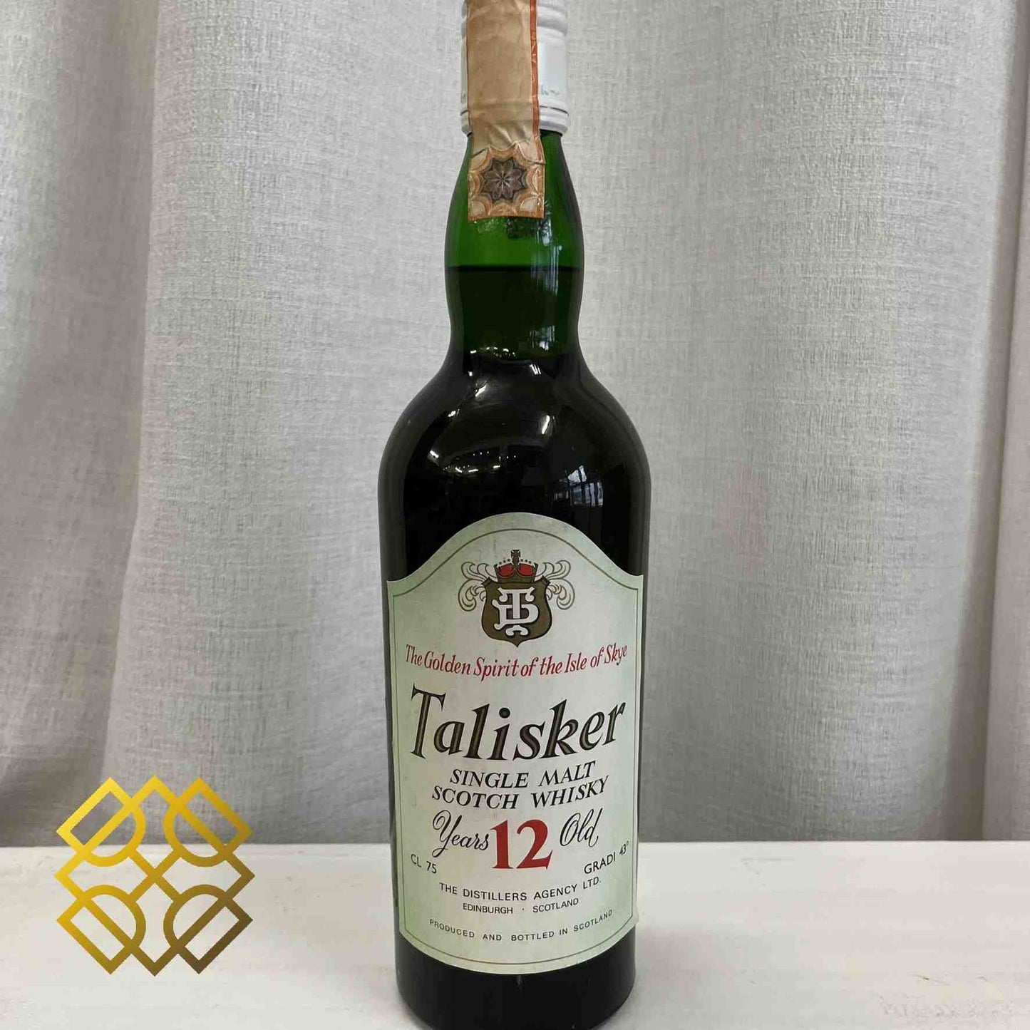 Talisker Type : Single Malt Whisky Age : 12YO gradi43 stand